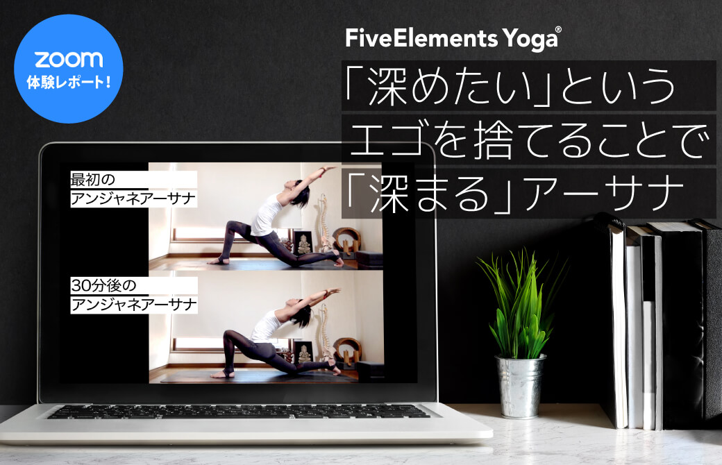 机の上のノートパソコン